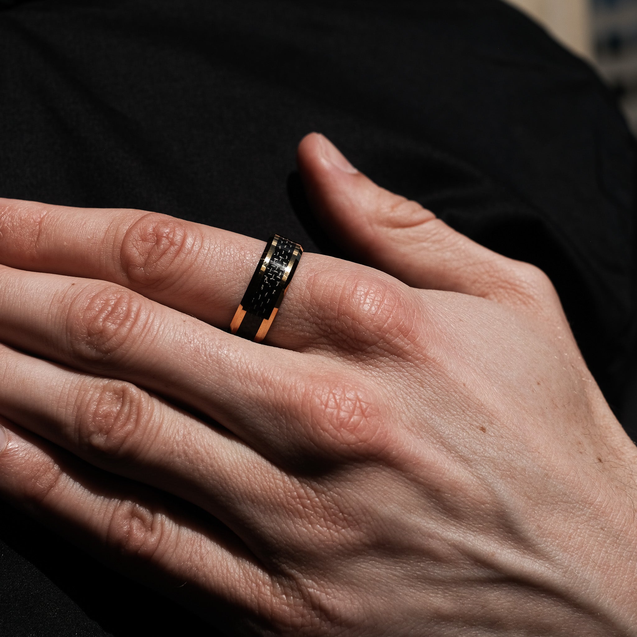 The Mr Interesting - Black Carbon Fibre Gold Tungsten Beveled Ring